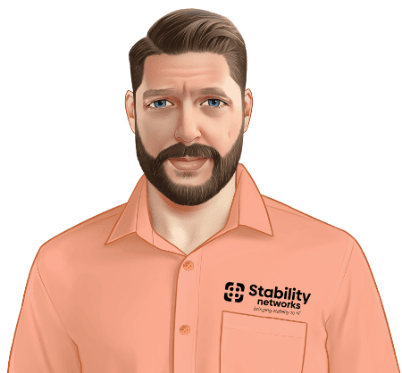 A digital illustration of a man with a beard and mustache, wearing an orange shirt with the "Managed IT Services & IT Cybersecurity" logo on it.